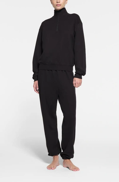 Shop Skims Cotton Blend Fleece Half Zip Sweatshirt In Onyx