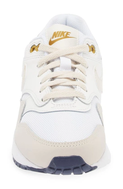 Shop Nike Kids' Air Max 1 Sneaker In White/ Light Orewood/ Bronzine