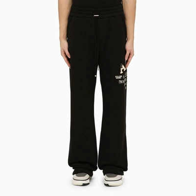 Shop Amiri Jogging Trousers With Logo In Black