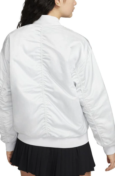 Shop Nike Sportswear Reversible Varsity Quilted Bomber Jacket In Photon Dust/ Photon/ Black