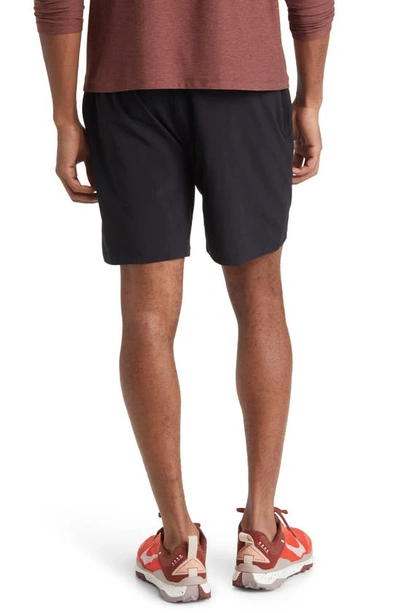 Shop Beyond Yoga Pivotal Lined Stretch Shorts In Black