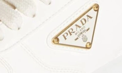 Shop Prada Triangle Logo Lace-up Sneaker In Ivory