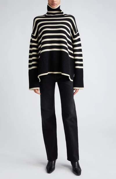 Totême Toteme Striped Wool Cotton Turtleneck In Black Stripe