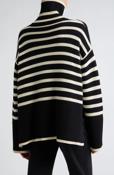 Totême Toteme Striped Wool Cotton Turtleneck In Black Stripe