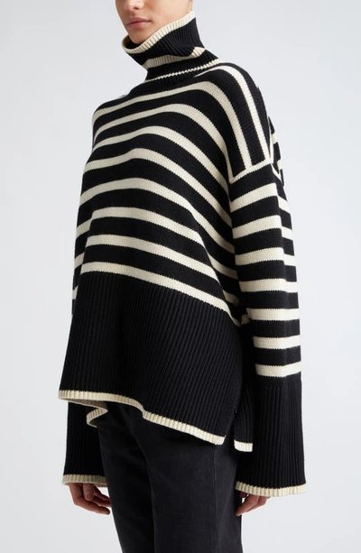 Totême Toteme Striped Wool Cotton Turtleneck In Black Stripe