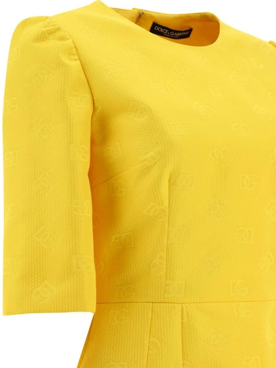 Shop Dolce & Gabbana Dress With "dg" Motif In Yellow