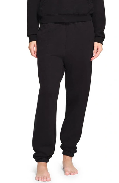 Shop Skims Revised Classic Cotton Blend Jogger Sweatpants In Onyx