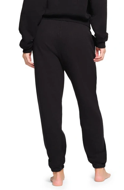 Skims Revised Classic Cotton Blend Fleece Sweatpants In Onyx
