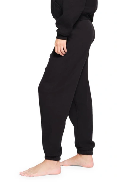 Skims Revised Classic Cotton Blend Fleece Sweatpants In Onyx