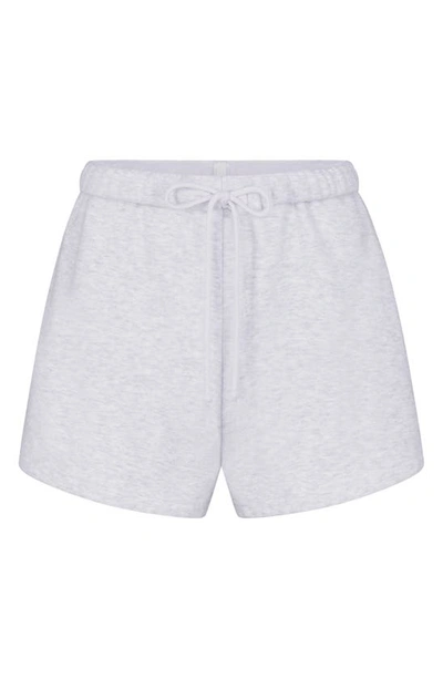 Shop Skims Cotton Blend Fleece Classic Shorts In Light Heather Grey