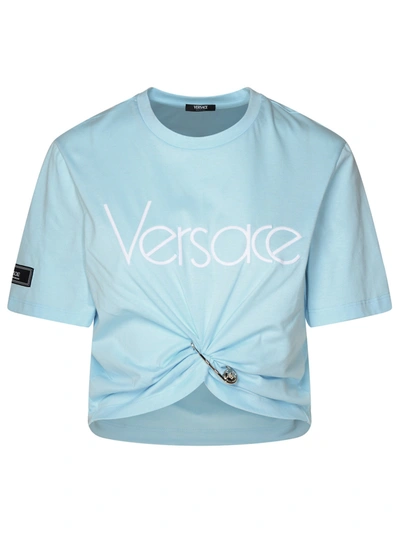 Shop Versace Woman  Light Blue Cotton T-shirt