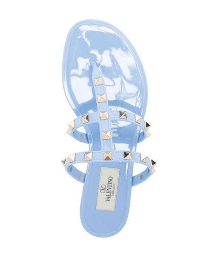 Shop Valentino Garavani Rockstud Rubber Thong Sandals In Clear Blue