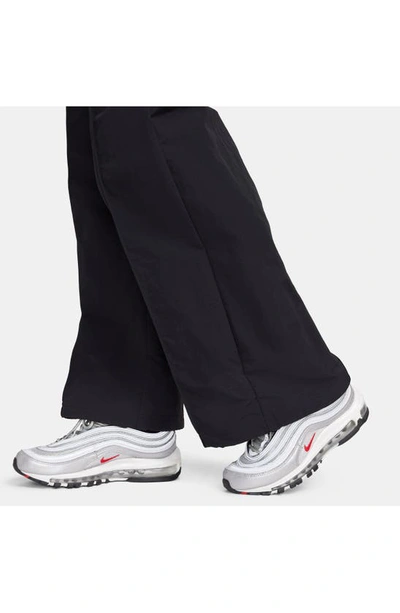 Shop Nike Wide Leg Pants In Black/ White