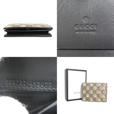 Shop Gucci Portefeuille Animalier Brown Canvas Wallet  ()