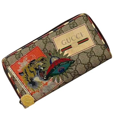 Shop Gucci Zip Around Brown Canvas Wallet  ()