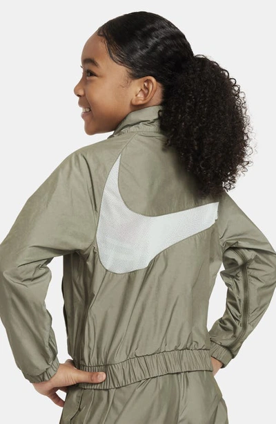 Shop Nike Kids' Sportswear Windrunner Water Repellent Jacket In Medium Olive/ Light Bone