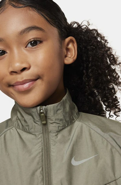 Shop Nike Kids' Sportswear Windrunner Water Repellent Jacket In Medium Olive/ Light Bone
