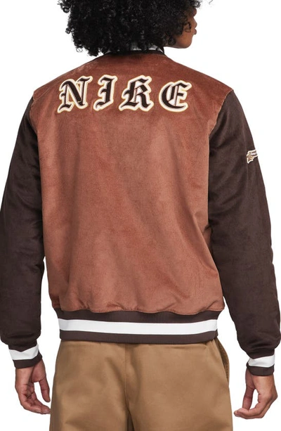 Shop Nike Corduroy Varsity Jacket In Archaeo Brown/ Baroque Brown