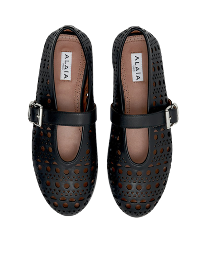 Alaïa Buckle Perforated Round Toe Ballerina Shoes In Black