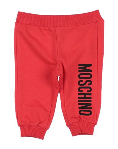 Shop Moschino Baby Newborn Pants Red Size 3 Cotton, Elastane