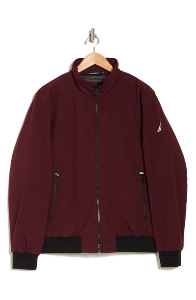 Shop Nautica Transitional Water Resistant Bomber Jacket In Bold Burgundy