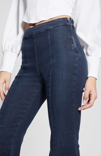 Shop Guess Sofia 1981 Frayed Ankle Flare Jeans In Blue