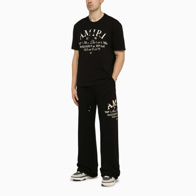 Shop Amiri Black Jogging Trousers With Logo Men