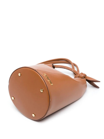 Shop Jacquemus Women Le Petit Tourni Bucket Bag In Brown