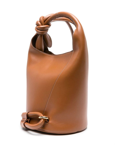 Shop Jacquemus Women Le Petit Tourni Bucket Bag In Brown