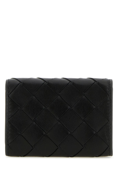 Shop Bottega Veneta Black Leather Tiny Intrecciato Wallet