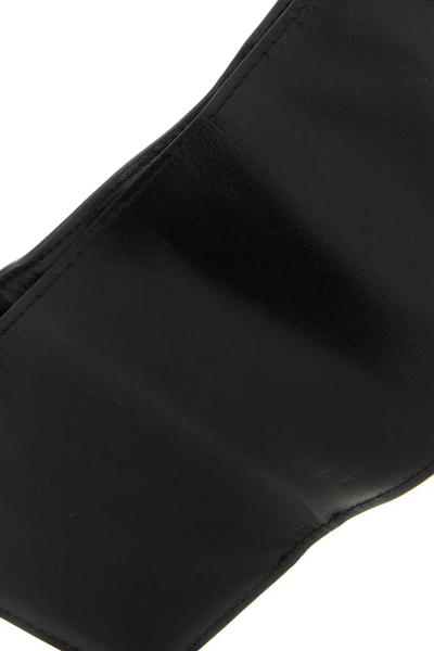 Shop Bottega Veneta Black Leather Tiny Intrecciato Wallet