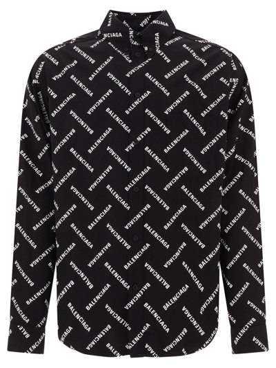 Shop Balenciaga Allover Logo Printed Long-sleeved Shirt In Black