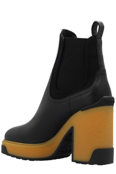 Shop Moncler Isla Heeled Ankle Boots In Black