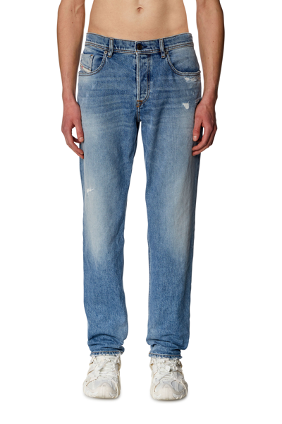 Shop Diesel Tapered Jeans In Blue