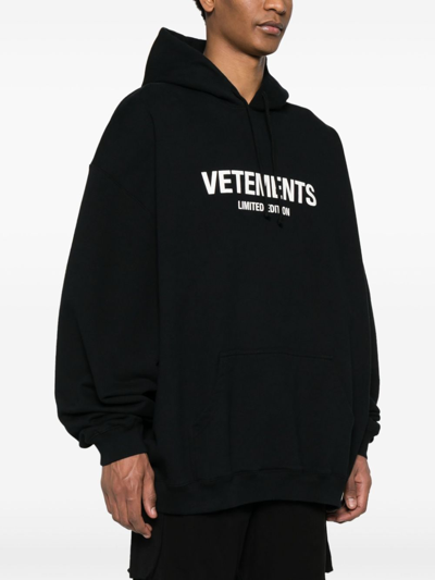 Shop Vetements Logo Cotton Blend Hoodie In Black