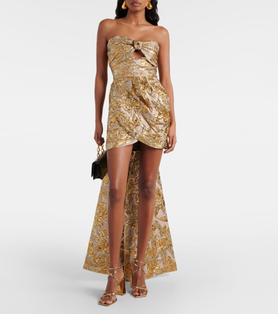 Shop Johanna Ortiz Bow-detail Cutout Brocade Minidress In Gold