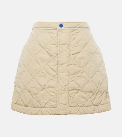Shop Burberry Quilted High-rise Miniskirt In Beige