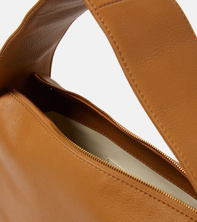Shop Khaite Elena Leather Shoulder Bag In Brown