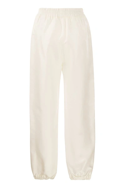 Shop Moncler Twill Joggers In White