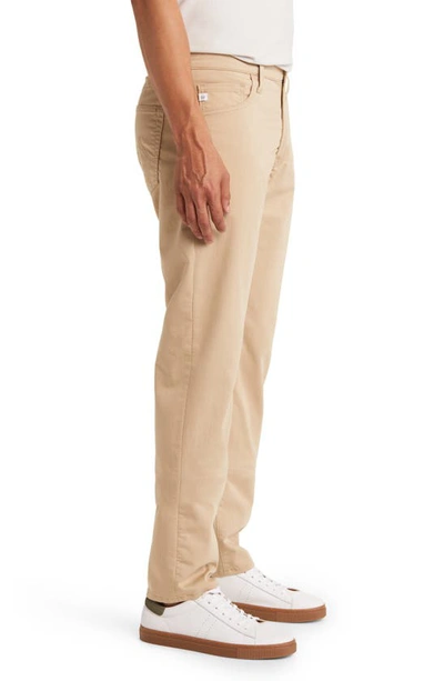 Shop Ag Tellis Airluxe™ Commuter Performance Sateen Pants In Drifting Sands