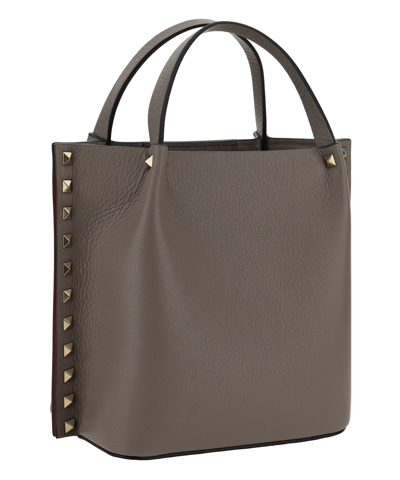 Shop Valentino Rockstud Tote Bag In Brown