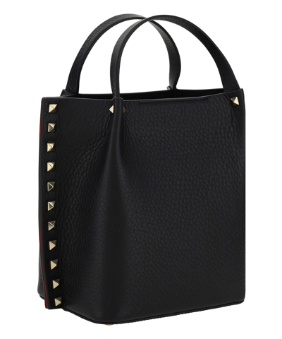 Shop Valentino Rockstud Tote Bag In Black