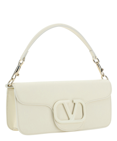 Shop Valentino Locò Handbag In White