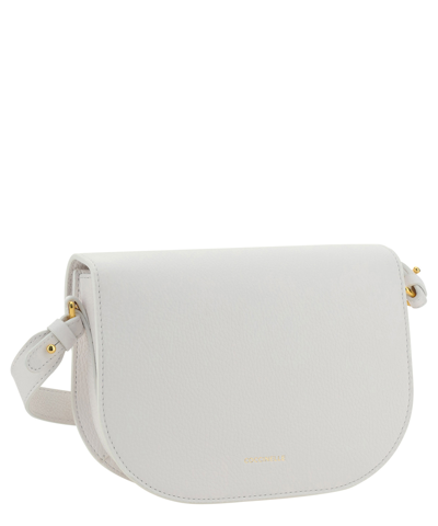 Shop Coccinelle Dew Crossbody Bag In White