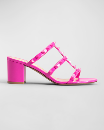 Shop Valentino Rockstud Tonal Patent Caged Sandals In Pink