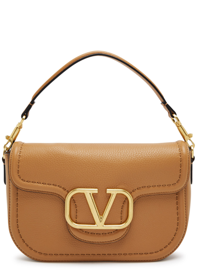 Shop Valentino Garavani Locò Grained Leather Shoulder Bag In Tan