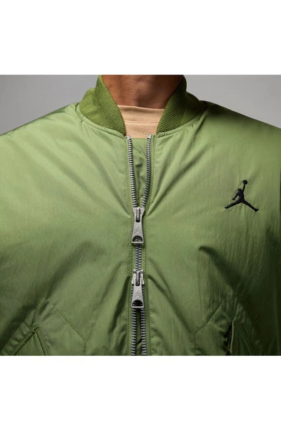 Shop Jordan Essentials Renegade Water Repellent Bomber Jacket In Sky J Light Olive/ Black
