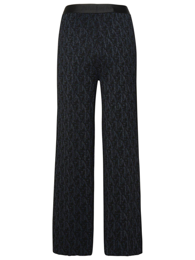 Palm Angels Monogram-jacquard Side Stripe Detailed Trousers In Black Black