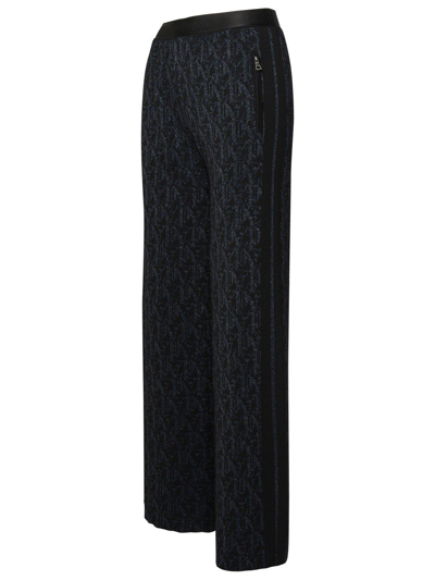 Palm Angels Monogram-jacquard Side Stripe Detailed Trousers In Black Black