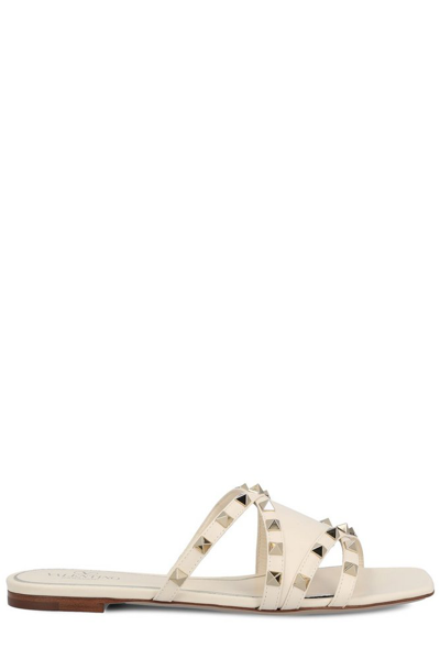 Shop Valentino Garavani Rockstud Flat Sandals In White